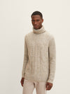 Turtleneck sweater with a cable knit pattern